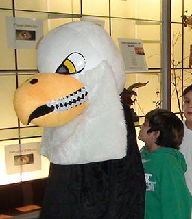 sidebargraphic_Directory eagle mascot with children